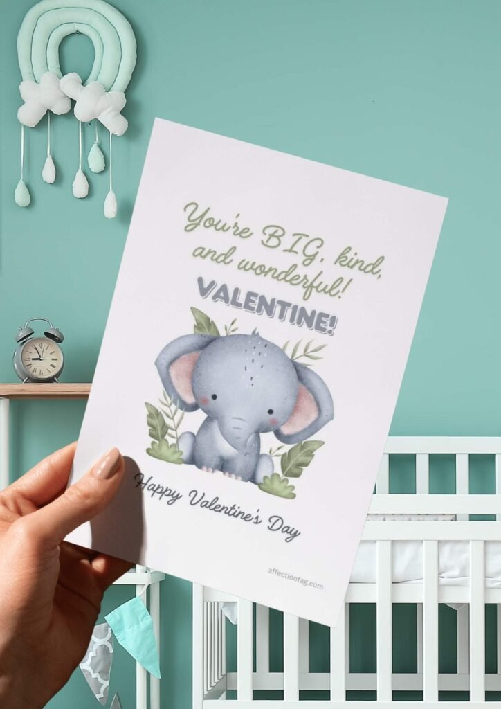 A watercolor elephant sitting with greenery, accompanied by the text "You're BIG, kind, and wonderful, Valentine! Happy Valentine's Day."