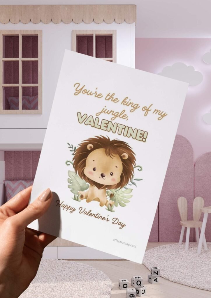 A cheerful watercolor lion with green jungle leaves and the text "You're the king of my jungle, Valentine! Happy Valentine's Day."